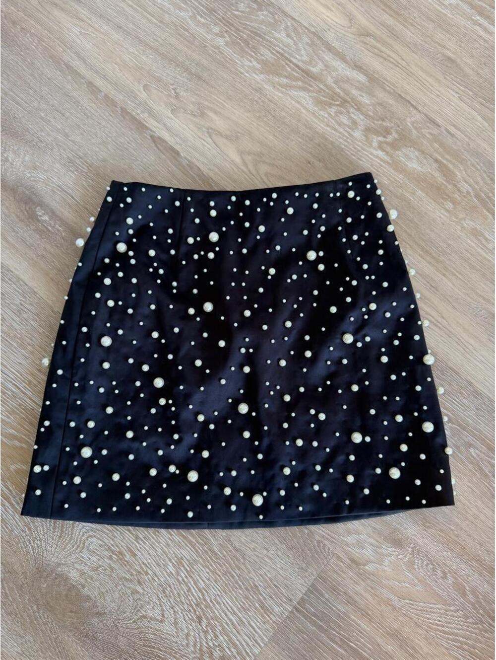 Black satin H&M mini skirt with pearl embellishments